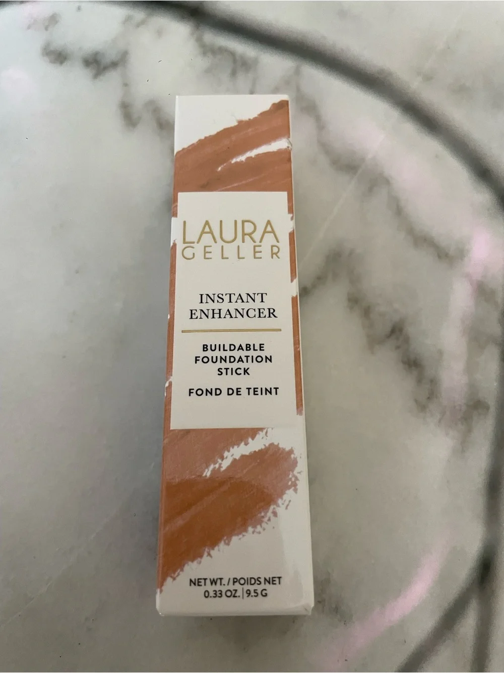 New Laura Geller instant enhancer, buildable foundation stick, medium